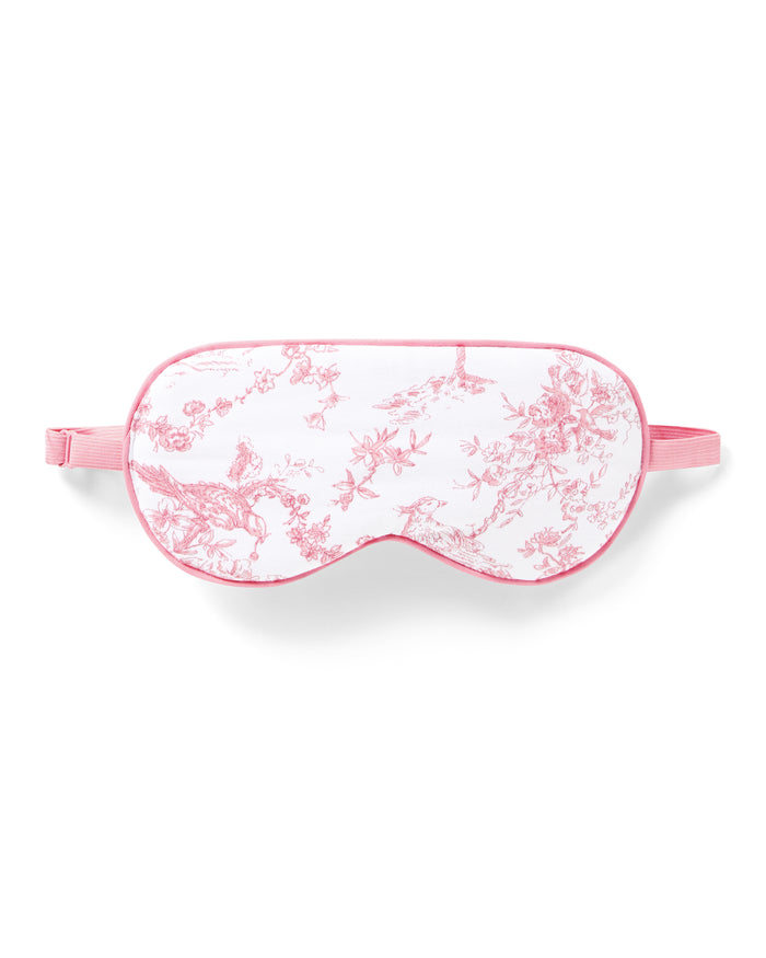 Experience luxury with the Petite Plume Adults Pima Sleep Mask in Pink Timeless Toile. This sleep mask is crafted from soft fabric, adorned with botanical flowers, and includes an adjustable strap to ensure the perfect fit for a restful nights sleep.