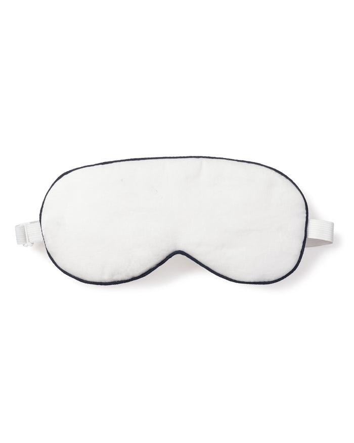 The Adults Twill Sleep Mask by Petite Plume, with navy piping and an adjustable strap, offers luxury and light-blocking comfort. Ideal for monogrammed gifts, it promises restful nights and sweet dreams.