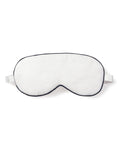 The Adults Twill Sleep Mask by Petite Plume, with navy piping and an adjustable strap, offers luxury and light-blocking comfort. Ideal for monogrammed gifts, it promises restful nights and sweet dreams.