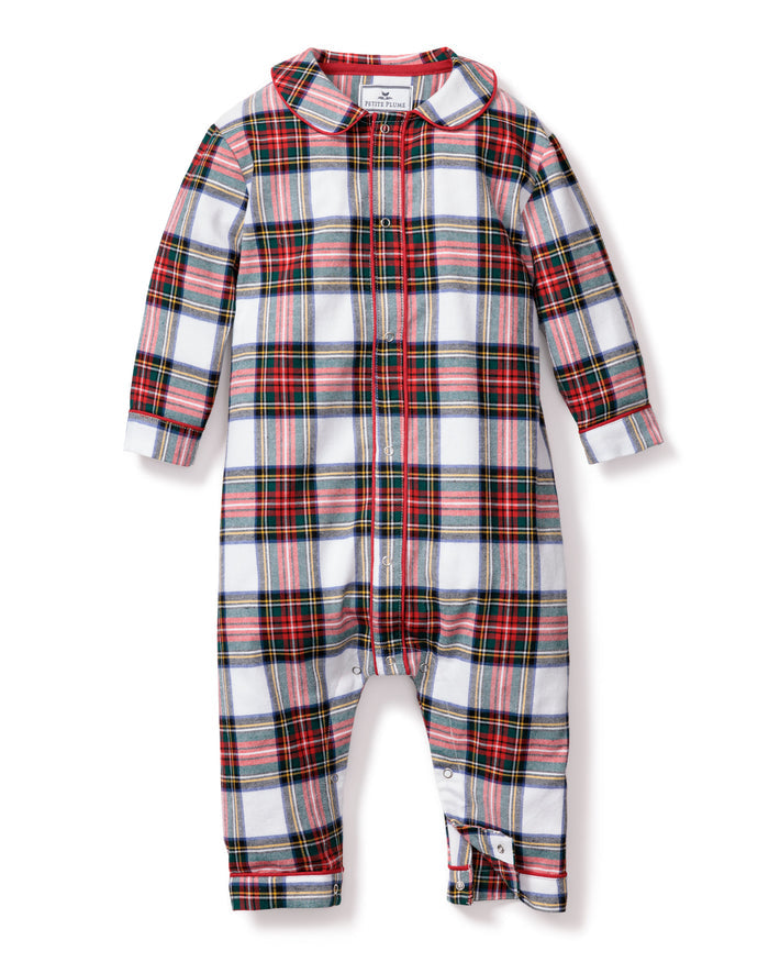 The Petite Plume Babys Brushed Cotton Cambridge Romper in Balmoral Tartan features a Scottish-inspired red, green, and black plaid on white. This yarn-dyed cotton romper offers long sleeves, a button-up front, and leg snap closures for easy changing.