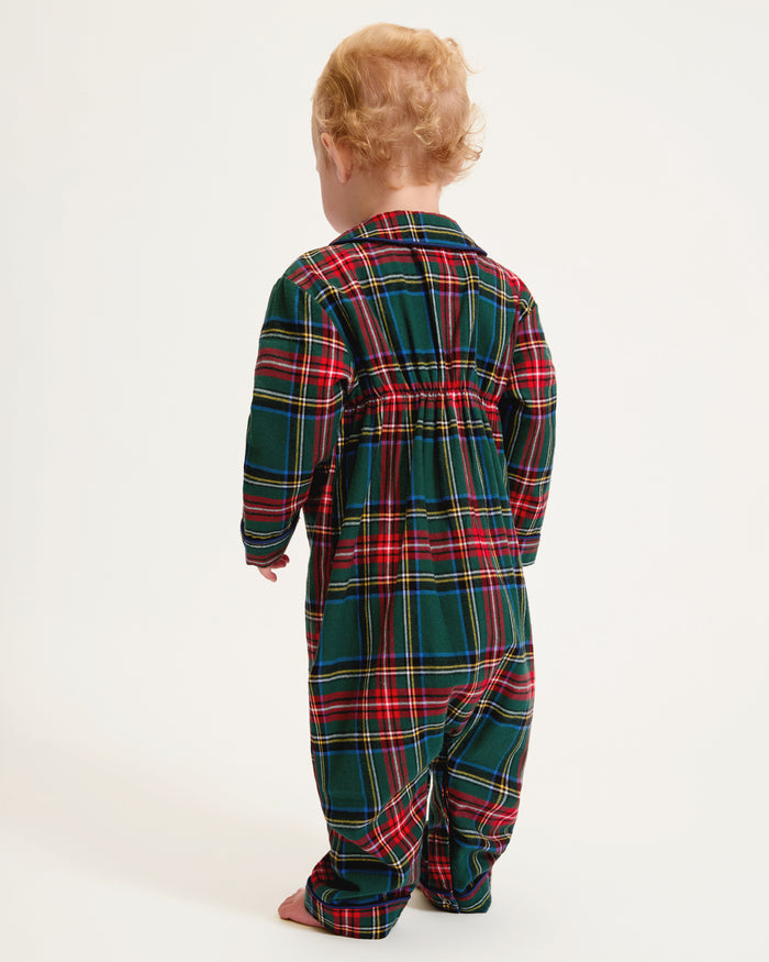 The Baby's Brushed Twill Cambridge Romper in Kensington Tartan features long sleeves, full length, a green, red, and blue plaid design, front zipper, leg snap buttons, and a rounded collar.