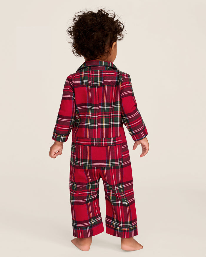 The Baby's Brushed Twill Classic Romper in Imperial Tartan features long sleeves, a collar, button front, and snap leg closures for easy diaper changes. Showcased on a white background, it has a red base with green, white, and yellow stripes.
