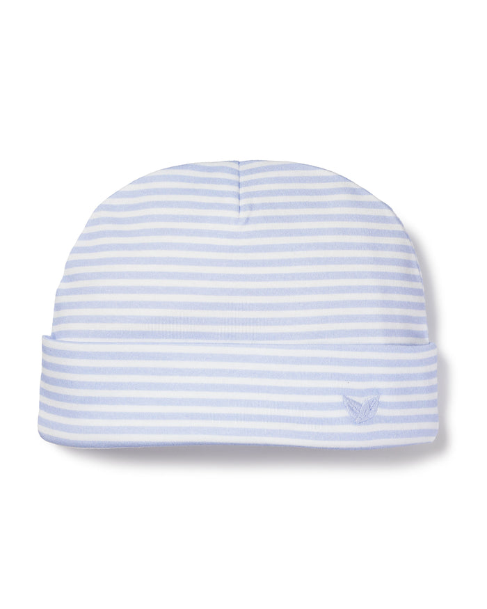 The Babys Pima Hat in Blue Stripes by Petite Plume is crafted from soft Peruvian Pima Cotton and features a small embroidered butterfly logo on the folded brim, making it the perfect baby hat choice.