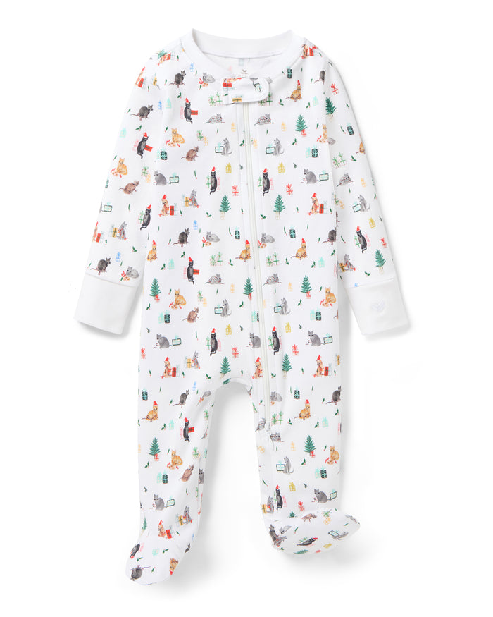 The Baby's Pima Romper in Merry Meow is a white onesie with a front zipper, covered feet, long sleeves, and playful prints of animals, trees, and people enjoying outdoor adventures like camping and fishing.
