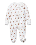 The Baby's Pima Romper in Teddy Tales features a white base with an all-over brown teddy bear print, long sleeves, a zip closure from neck to leg, and a snap button at the collar.