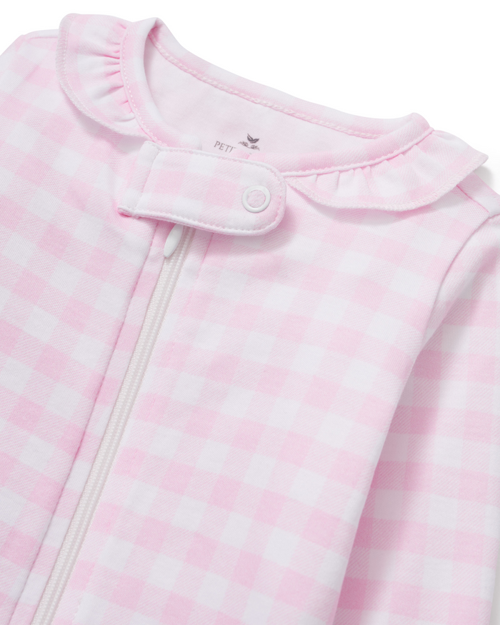Close-up of the Baby’s Pima Ruffle Collar Romper in Pink Gingham, featuring a ruffled collar, front zipper, and snap button at the neck.