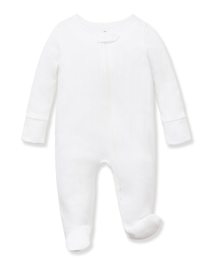 The Baby's Pointelle Footie Romper in White features long sleeves, covered feet, a front zipper, and a single neckline button, shown laid flat on a white background.