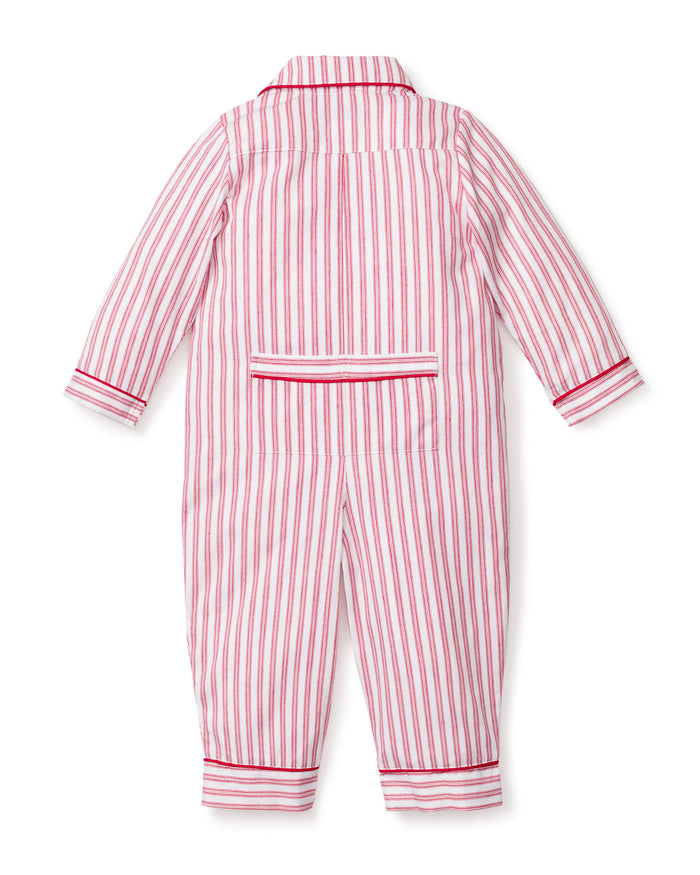 The Babys Twill Romper in Antique Red Ticking by Petite Plume is a childs long-sleeve jumpsuit with vertical red and white stripes, made from lightweight brushed twill. It features a collar, red trim on the cuffs and ankles, and a back flap pocket.