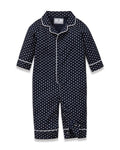 The Baby's Twill Classic Romper in Midnight Hearts is a navy blue onesie with long sleeves and legs, featuring a white heart pattern and white piping on the collar, cuffs, and front.