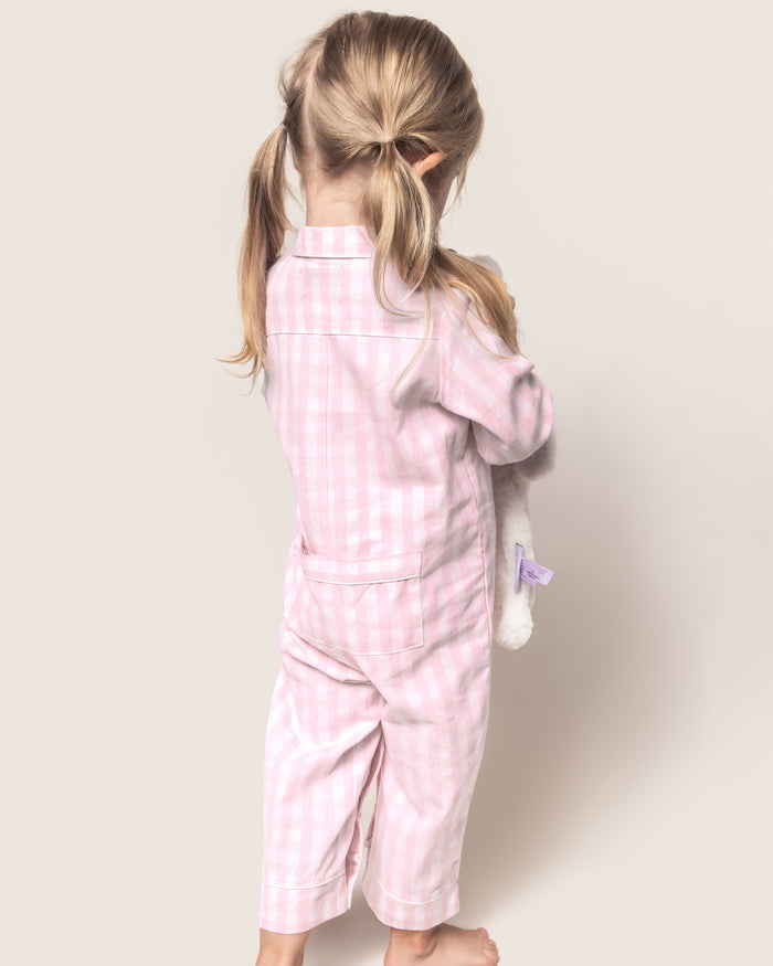 Baby's Twill Classic Romper in Pink Gingham: long sleeves, small collar, button front, footless legs. Light pink and white checkered design. Garment shown flat on a white background.