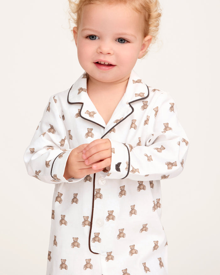 A white and brown Baby's Twill Classic Romper in Teddy Tales.