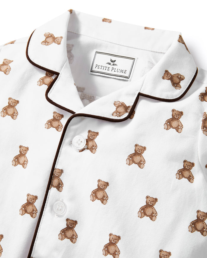 A white and brown Baby's Twill Classic Romper in Teddy Tales.