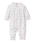 The Petite Plume Babys Flannel Madeline Romper in Sugar Plum Fairy features a white onesie with pink ballerina and bunny prints made of flame-retardant fabric. It includes a ruffled collar and cuffs, snap closures down the front and legs, making it perfect for childrens sleepwear.
