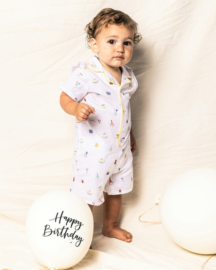 Short-sleeve pajama top with colorful pattern on a white background