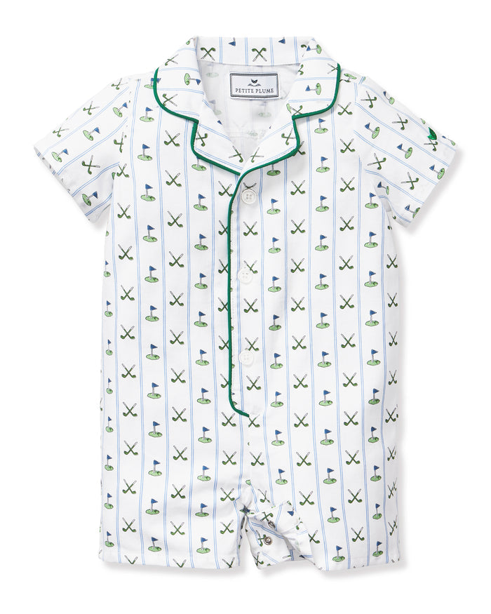 The Baby's Twill Summer Romper in Fairway Stripe is a short-sleeved, button-down romper with green piping, decorated with golf clubs and holes on white fabric with blue vertical stripes.
