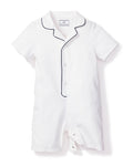 Petite Plumes Babys Twill Summer Romper features a luxurious yarn-dyed cotton design with short sleeves and navy piping on the collar. This classic white romper includes center buttons and a bottom closure for easy changes.