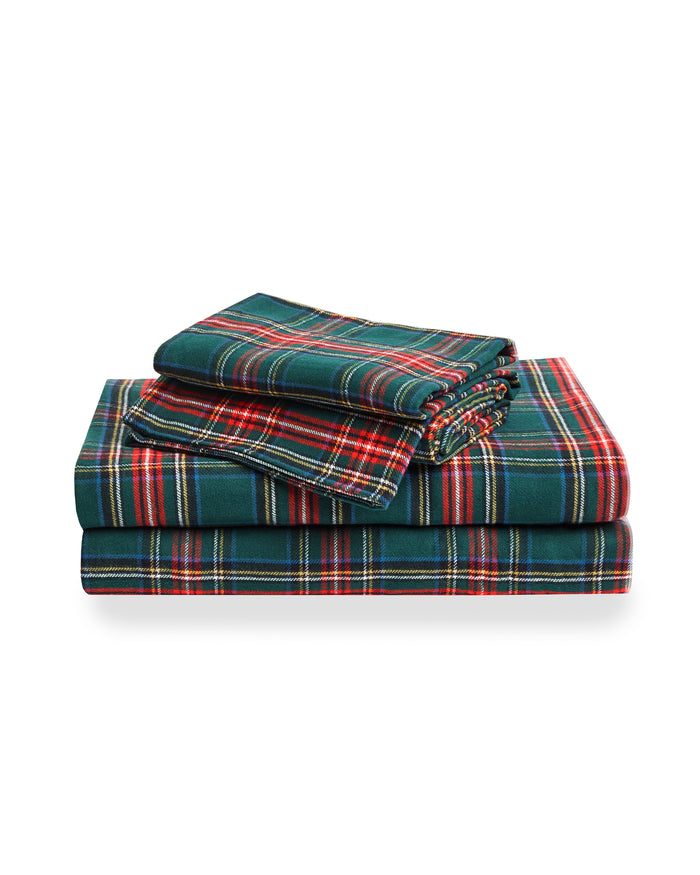 The Flannel Bed Sheet Set in Kensington Tartan features a neatly folded green, red, and white checkered plaid design, displayed against a white background.