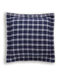 The Flannel Euro Sham in Oxford Tartan features a rectangular shape and a navy blue and white plaid checkerboard pattern set against a crisp white background.