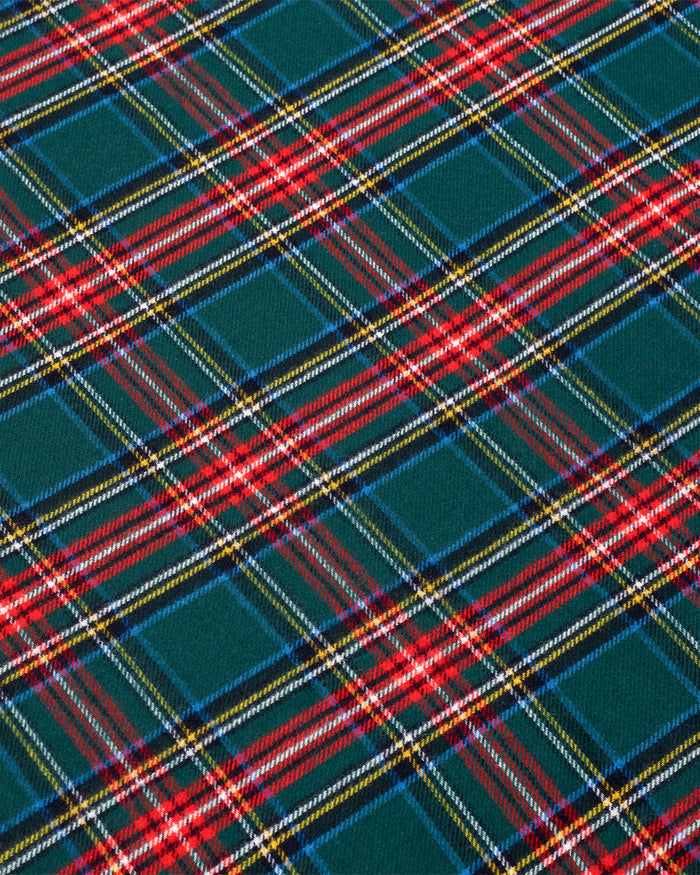 Two Flannel Pillow Cases in Kensington Tartan, featuring a green, red, and yellow plaid pattern, are stacked against a white background.