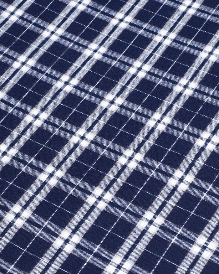 Two Flannel Pillow Cases in Oxford Tartan, each with a navy blue and white plaid pattern, are stacked on top of each other against a plain white background.