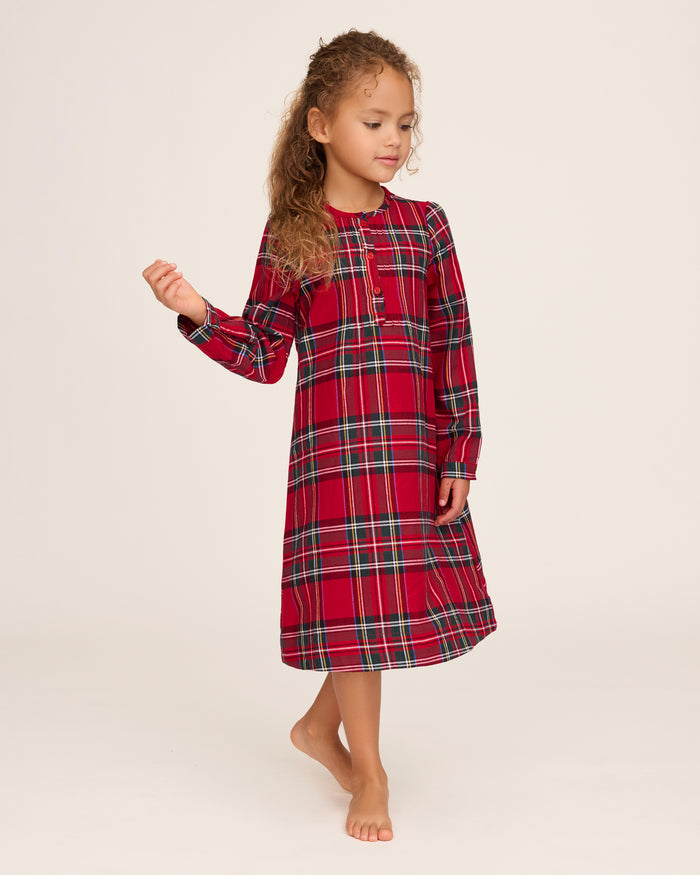 The Girl's Brushed Twill Beatrice Nightgown in Imperial Tartan is a long-sleeved, knee-length nightgown with a red, green, black, and white plaid, partial front buttons, and gentle shoulder gathers.