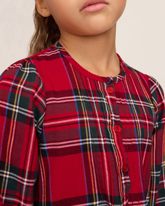 The Girl's Brushed Twill Beatrice Nightgown in Imperial Tartan is a long-sleeved, knee-length nightgown with a red, green, black, and white plaid, partial front buttons, and gentle shoulder gathers.
