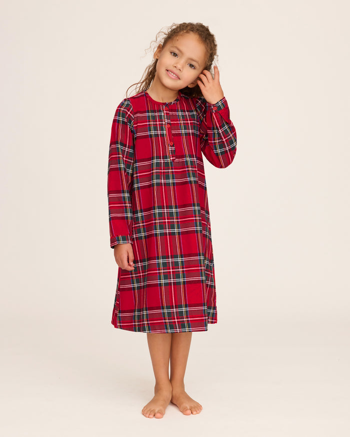 The Girl's Brushed Twill Beatrice Nightgown in Imperial Tartan is a long-sleeved, knee-length nightgown with a red, green, black, and white plaid, partial front buttons, and gentle shoulder gathers.
