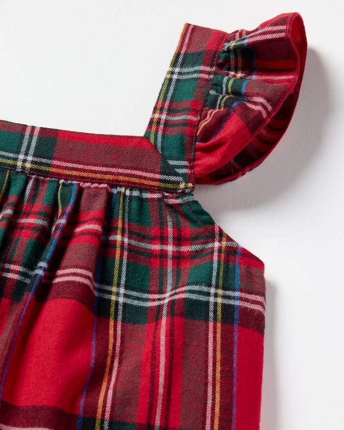 The Girl's Brushed Twill Clara Nightgown in Imperial Tartan is a sleeveless, knee-length nightgown with red, green, and white plaid, ruffled shoulder straps, and a gathered waist, shown against a white background.