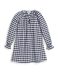 A long-sleeve dress with navy and white gingham print features a gathered neckline with a small tie, ruffled cuffs, and an A-line shape, reminiscent of Petite Plumes Girls Flannel Delphine Nightgown.