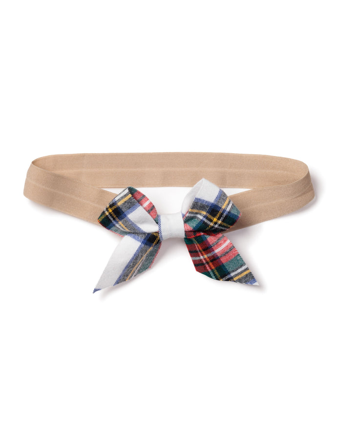 The Petite Plume beige headband, adorned with a decorative bow in red, green, white, and blue Balmoral Tartan, makes an ideal holiday gift for those who love stylish girls hair bows.