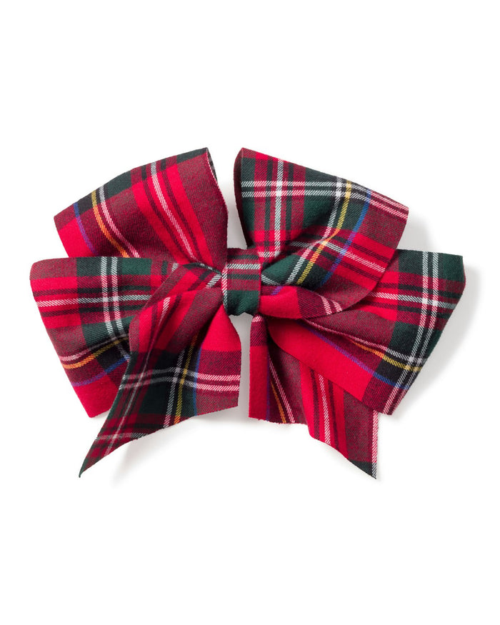 The Girls Hair Bow in Imperial Tartan by Petite Plume is a red plaid bow with green, white, and yellow stripes tied symmetrically, perfect for festive holiday wear.