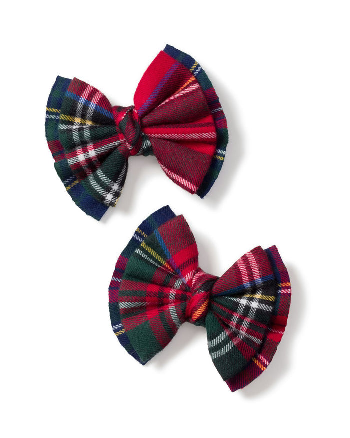Petite Plumes Girls Hair Bows in Imperial Tartan, with festive red, green, and blue patterns and pleated tails on a white background, make a perfect stylish holiday gift or stocking stuffer.