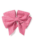 The Petite Plume Girls Hair Bow in Red Mini Gingham, crafted from charming fabrics with multiple loops and tails, serves as a delightful accessory displayed against a plain white background.