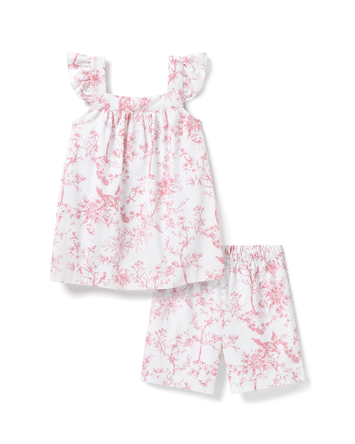 Petite Plumes Girls Twill Clara Short Set in Pink Timeless Toile includes a childs two-piece cotton sleepwear with a sleeveless, ruffled strap top and matching shorts, all adorned in a white backdrop with pink florals and bird patterns for dreamy comfort.