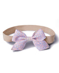 Two Girl's Twill Hair Bows in Fleur Blush, pink fabric bows with a floral pattern of white, yellow, and lavender flowers, displayed on a white background.