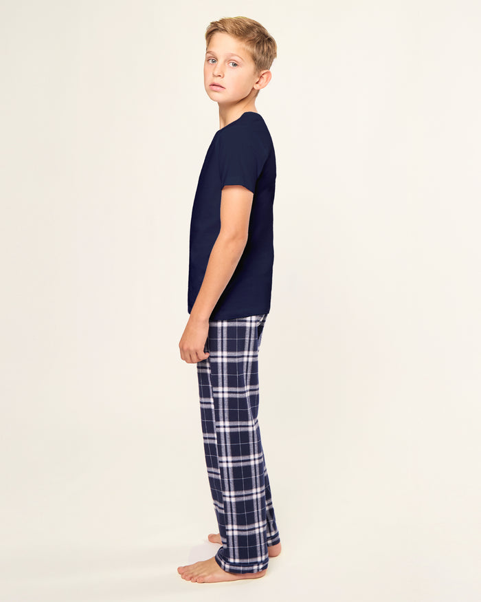 Kid's Brushed Twill Pant in Oxford Tartan, featuring navy blue and white plaid with an elastic waistband, shown laid flat on a white background.