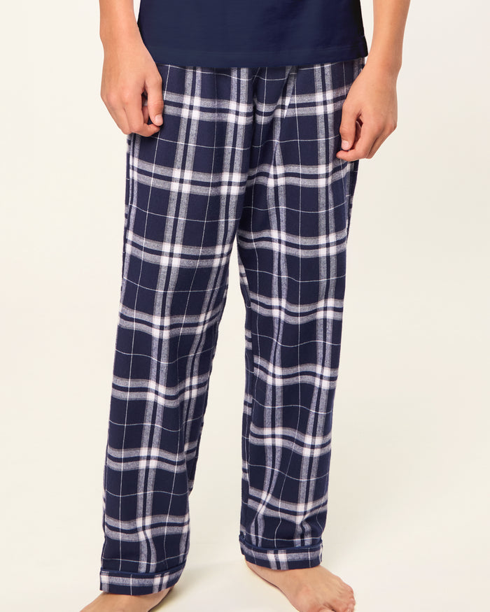Kid's Brushed Twill Pant in Oxford Tartan, featuring navy blue and white plaid with an elastic waistband, shown laid flat on a white background.
