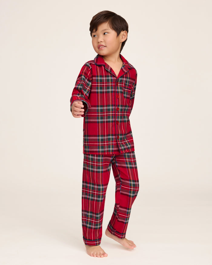 Kid's Brushed Twill Pajama Set in Imperial Tartan features a red, green, white, and black plaid design with a long-sleeve button-up top, chest pocket, collar, and matching pants.