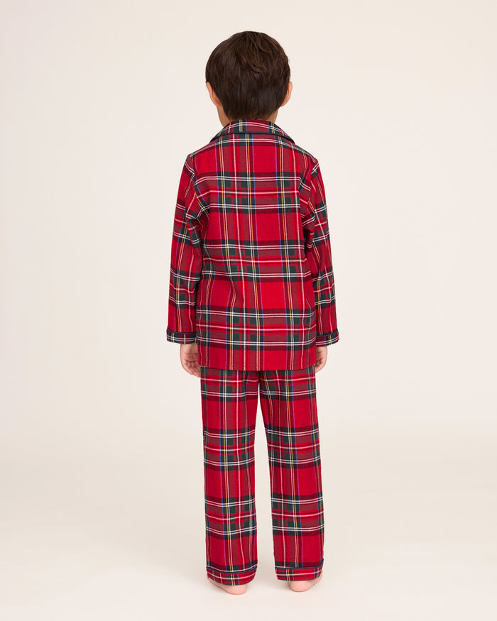 Kid's Brushed Twill Pajama Set in Imperial Tartan features a red, green, white, and black plaid design with a long-sleeve button-up top, chest pocket, collar, and matching pants.