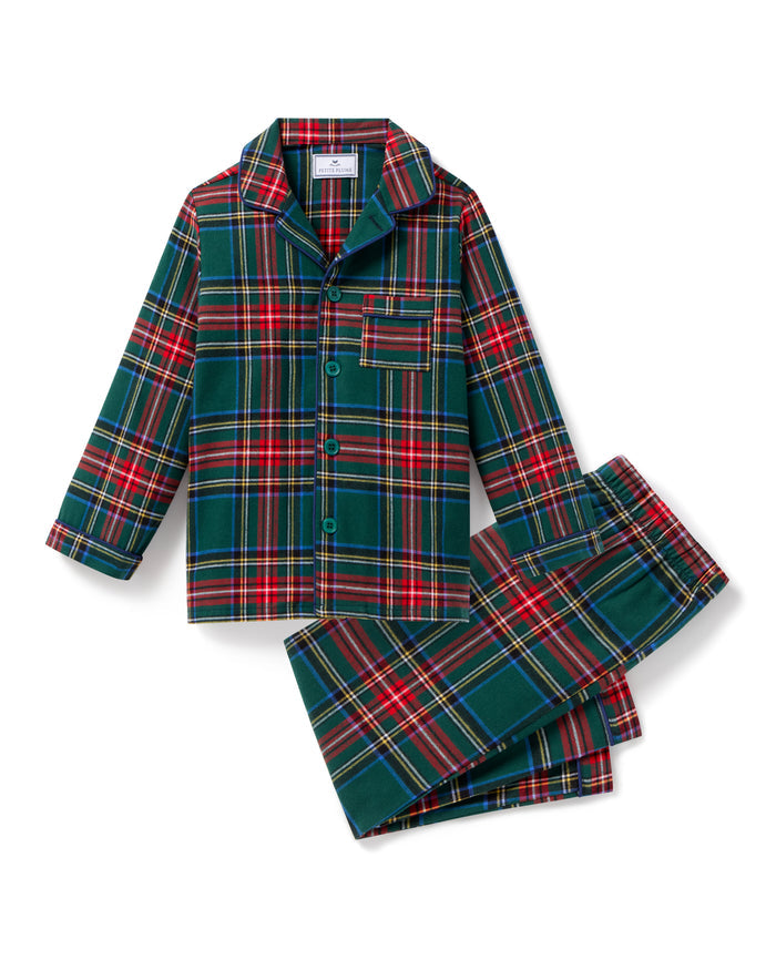 The Kid's Brushed Twill Pajama Set in Kensington Tartan, featuring a green, red, and yellow plaid button-up top with a chest pocket and matching long pants, is shown laid flat on a white background.