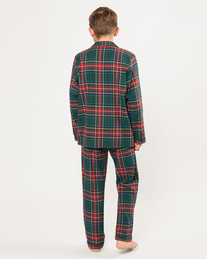 The Kid's Brushed Twill Pajama Set in Kensington Tartan, featuring a green, red, and yellow plaid button-up top with a chest pocket and matching long pants, is shown laid flat on a white background.
