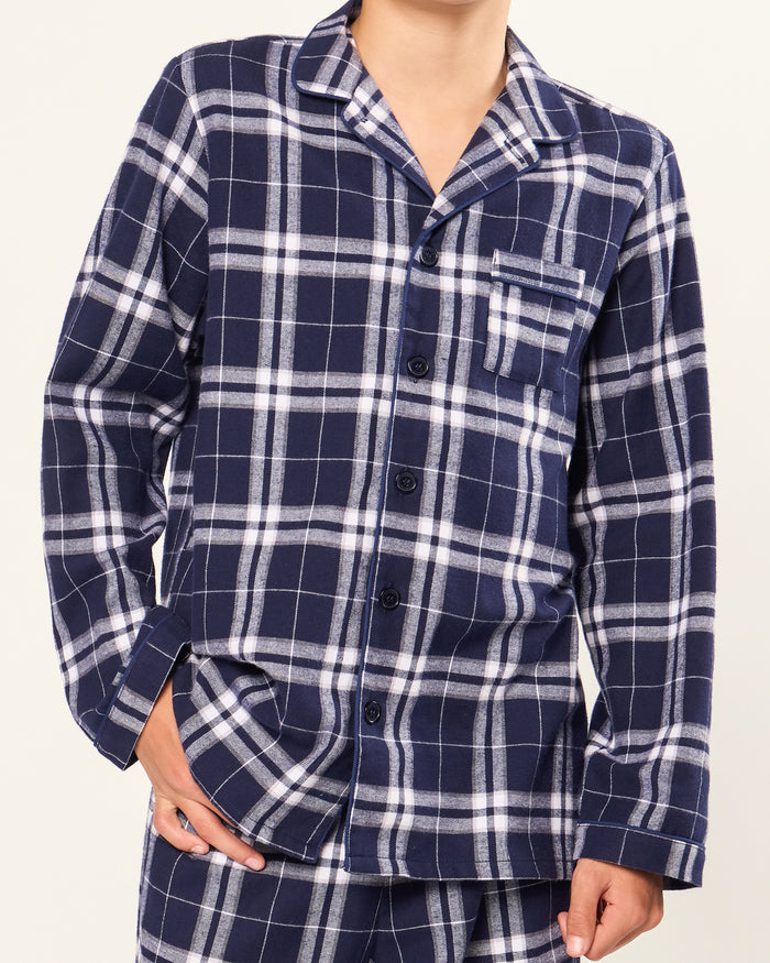 Kid's Brushed Twill Pajama Set in Oxford Tartan, featuring a navy and white plaid long-sleeve button-up top with chest pocket and matching elastic-waist pants, displayed neatly on a white background.