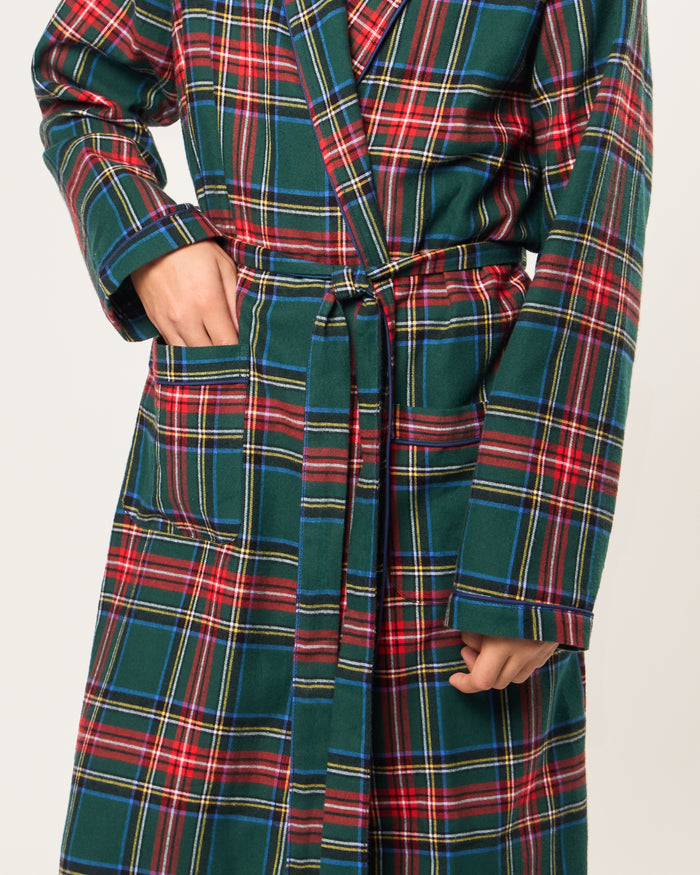 The Kid's Brushed Twill Robe in Kensington Tartan is knee-length with long sleeves, a shawl collar, two front pockets, and a matching belt. It features a classic green, red, and yellow tartan plaid pattern.