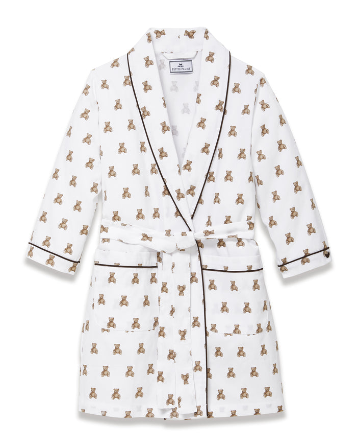 The Kid's Brushed Twill Robe in Teddy Tales features a white base with brown bear prints, black piping, two front pockets, and a matching waist belt.