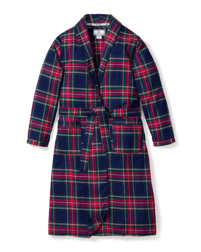 The Kid’s Brushed Twill Robe in Windsor Tartan features a long-sleeve design with a blue, green, red, and yellow plaid pattern, two large front pockets, a waist belt, and a shawl collar, shown laid flat on a white background.