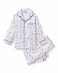 The Kid's Twill Pajama Set in Literary Lessons features a white collared, long-sleeve button-up top and matching pants with a colorful school-themed pattern and navy blue piping accents.
