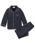 Kid's Twill Pajama Set in Midnight Hearts features navy blue pajamas with white heart prints, white piping, a long-sleeve button-up top with chest pocket, and matching pants.