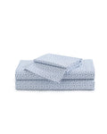 A neatly folded Luxe Premium Percale Bed Sheets set in Ditsy Waltz White, featuring a charming blue and white pattern, includes two pillowcases and a folded flat sheet, all displayed on a white background.