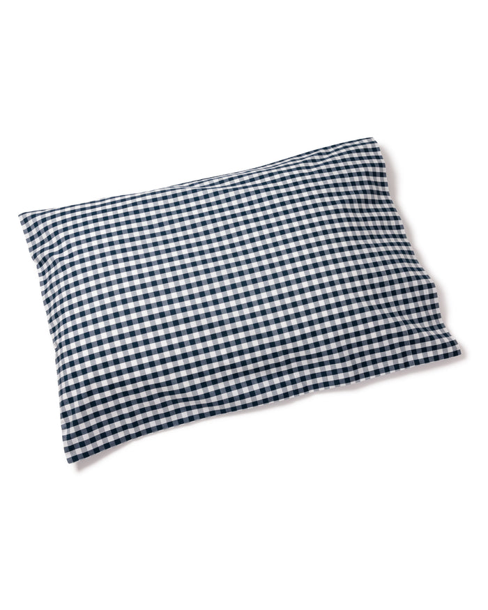 The Luxe Premium Cotton Navy Gingham Bed Sheets by Petite Plume feature a blue and white checkered pattern on a white background, adding an elegant touch to luxury sheets.