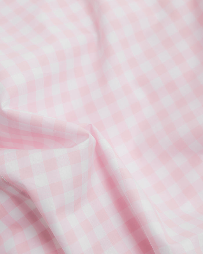 Blue and white checkered bedding set on a white background